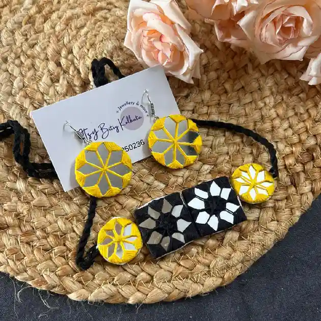 Handcrafted fabric choker and earring set with traditional yellow and black mirror work by Itsy Bitsy Kolkata.