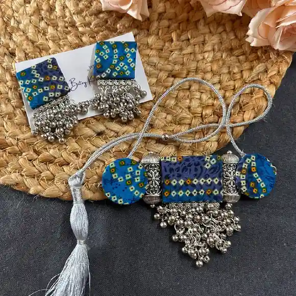 Handcrafted indigo blue bandhani print fabric choker and earring set with silver oxidised beads and ghungroo by Itsy Bitsy Kolkata.