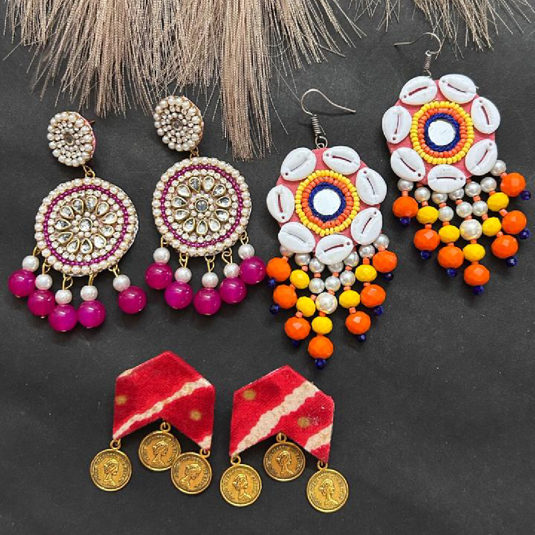 Handmade 3 pair earring combo pack featuring pink Kundan chandbalis, multicolored cowrie shell drops, and red fabric coin dangles from itsybitsykolkata.com.
